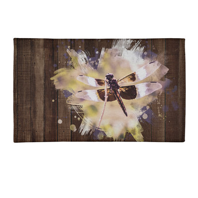 Tapis brun rustique libellule chenille