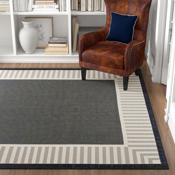 Alfombra rayada Delshire tejida a máquina para interiores y exteriores