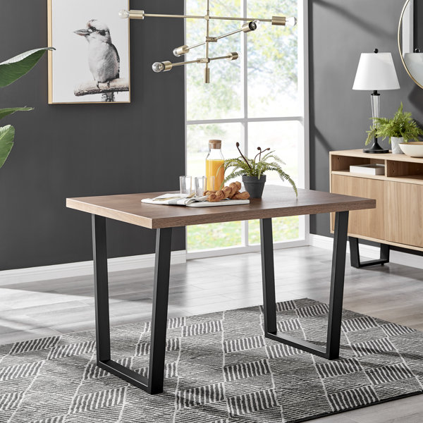 Mesa de comedor rectangular Edzard con efecto de veta de madera industrial
