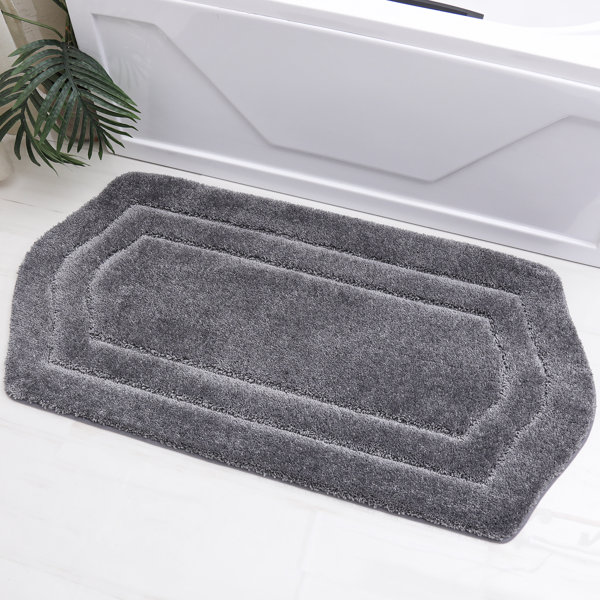 Alfombra de baño antideslizante Shilynn – Poliéster suave y absorbente, respaldo antideslizante, lavable a máquina