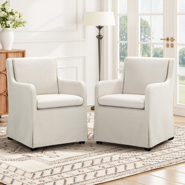 Sillón de comedor tapizado con ruedas