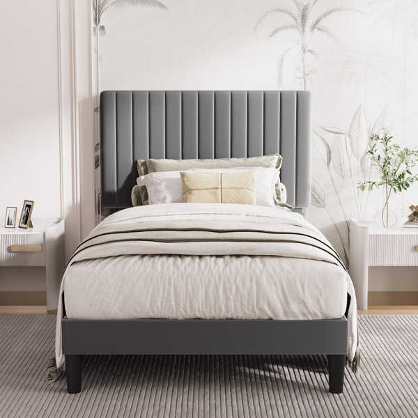 Cama tipo plataforma tapizada Dunphy con cabecero ajustable