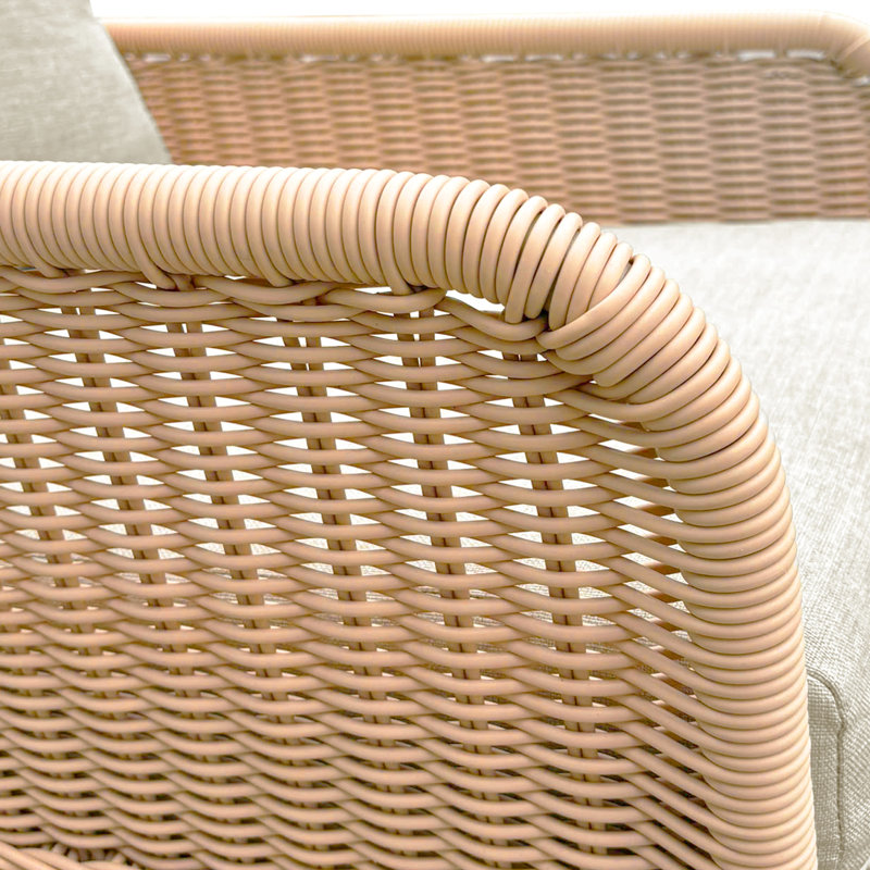 Chaise berçante beige avec coussins en PE et coussins moelleux pour une détente confortable et durable
