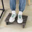 Repose-pieds inclinable en bois