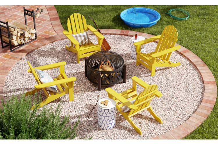 Round firepit with four yellow Adirondack chairs. 