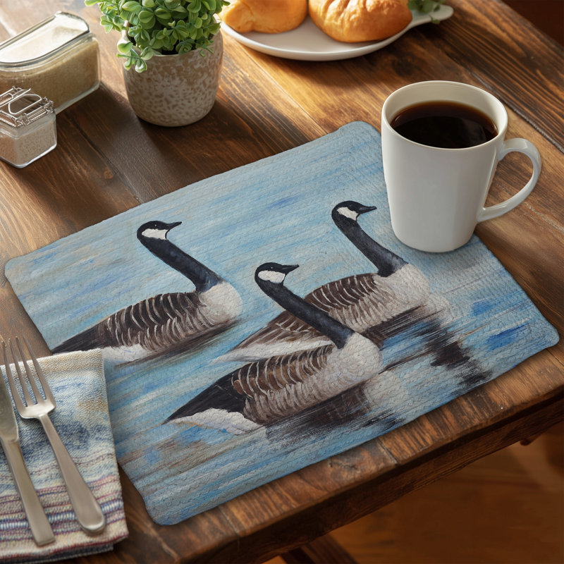 Ensemble de 4 napperons en polyester tressé - Bernaches du Canada dans l'eau
