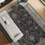 Wool Oriental Area Rug in Black/Camel