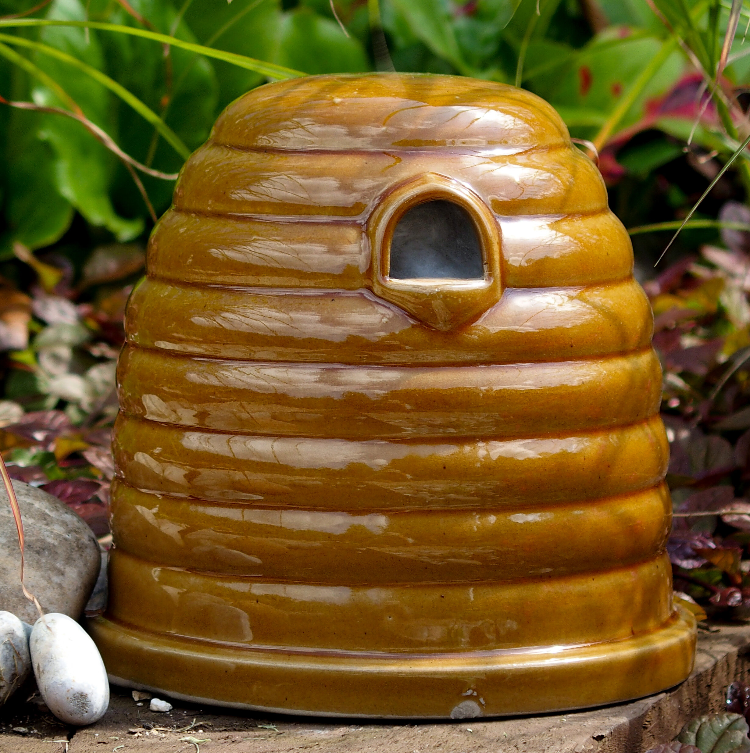 https://assets.wfcdn.com/im/10024069/compr-r85/7738/77385292/tatul-8-h-x-9-w-x-9-d-free-standing-rust-resistant-bumblebee-house.jpg