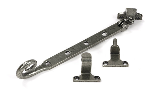 Monkeytail Stay (Steel Window), 26.6cm H x 3cm W x 1.3cm D, Pewter Patina