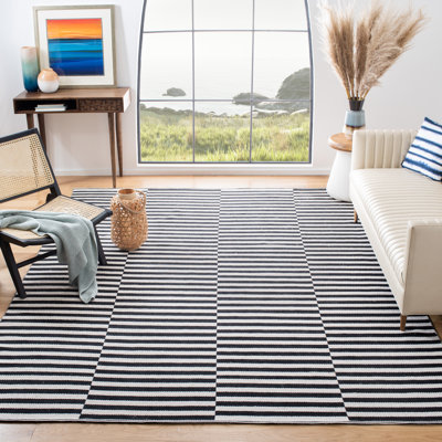 Tapis rayé ivoire / noir en coton tissé à plat Ilona