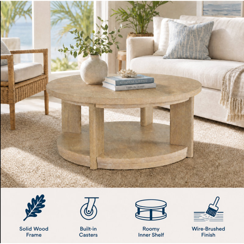 Ashal 40" Wide Coastal Round Cocktail Table in Sand Oak with Casters