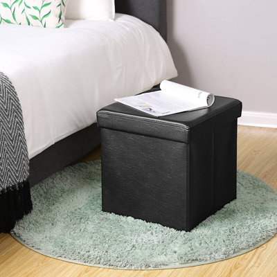 Repose-pieds pliable en similicuir avec rangement