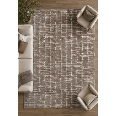 Areonna Brown And Ivory Recycled Polyester Area Rug