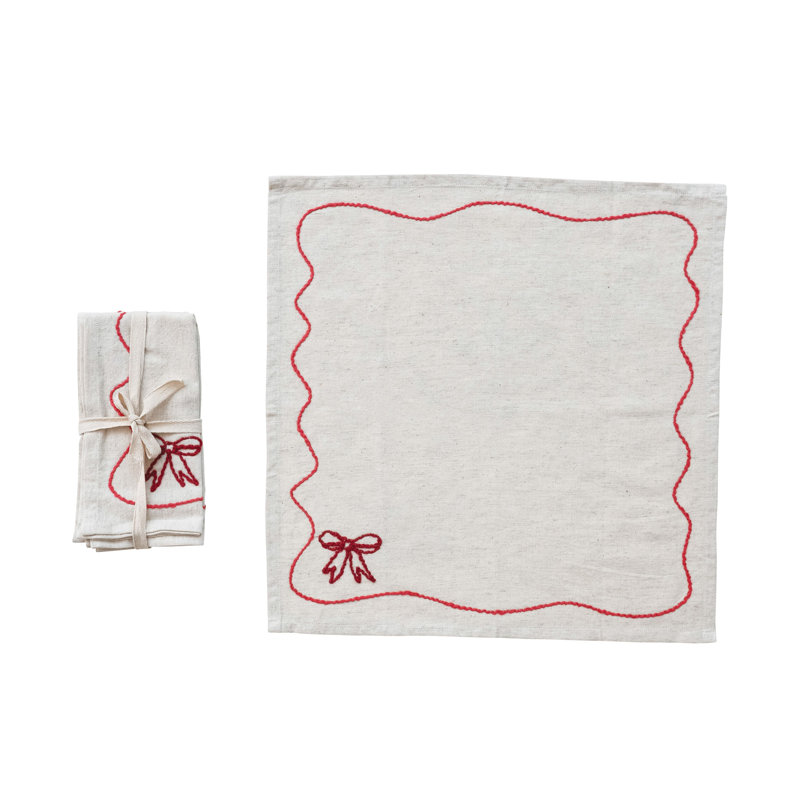 Serviettes en coton et lin avec nœud brodé et bordure festonnée