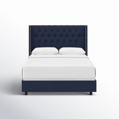 Breckin Upholstered Wingback Bed