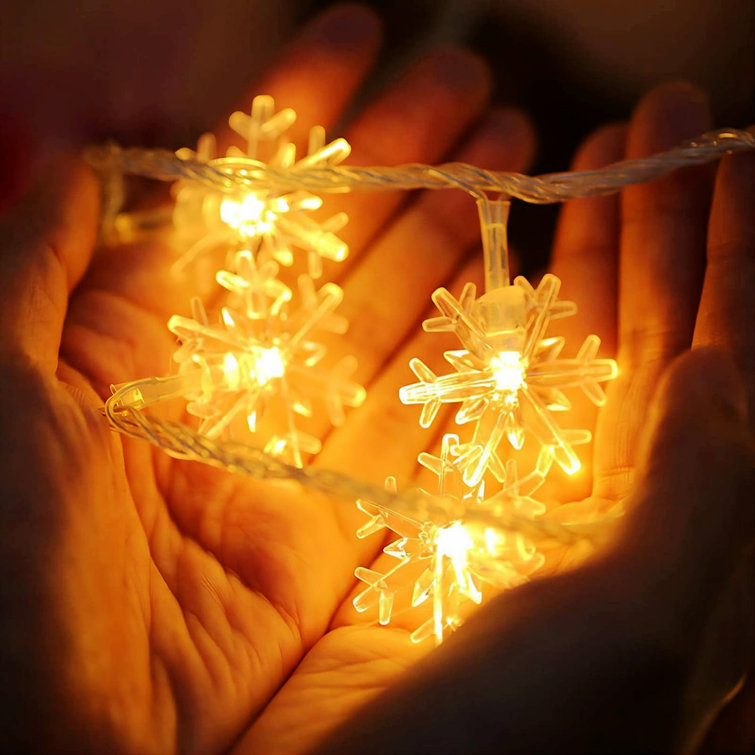https://assets.wfcdn.com/im/10050767/resize-h755-w755%5Ecompr-r85/2621/262164337/Christmas+Snowflake+String+Lights%2C+20+FT+40+LED+Battery+Operated+Fairy+Lights+With+Remote%2C+8+Modes+Timer+Hanging+Decor+For+Bedroom+Room+Patio+Party+Wall+Indoor+Outdoor+Xmas+Tree+Decorations+Warm+White.jpg