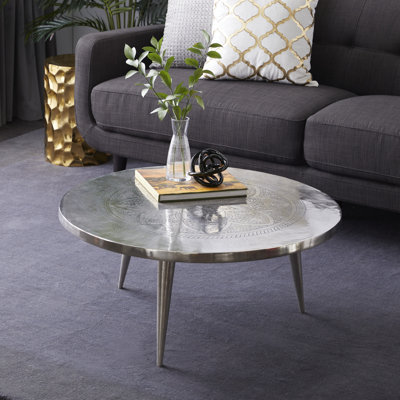 Table basse à motif floral en aluminium argenté