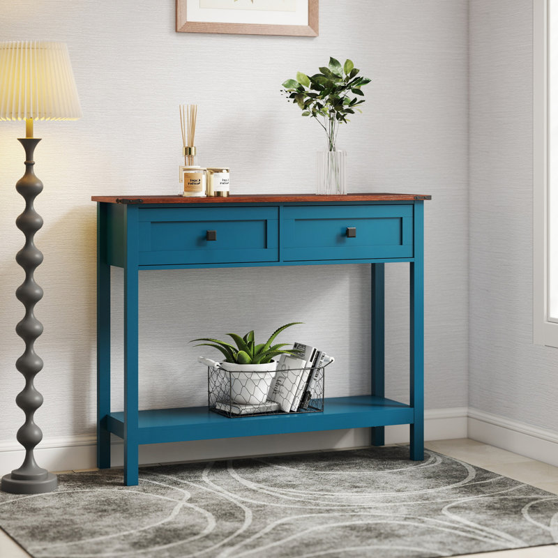 Console de style campagnard avec 2 tiroirs et une tablette de rangement inférieure, derrière le canapé, Bleu