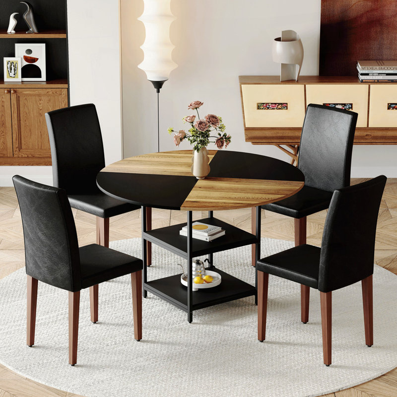 Ensemble de table et de chaises.Une table de salle à manger circulaire de couleur moderne épissée de 47,3 pouces de diamètre - rangement double couche. Combinée avec 4 chaises de salle à manger en tissu, simples et polyvalentes, confortables.