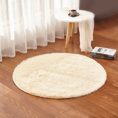 Tapis rond en coton crème à poils longs Gralf