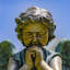 Statue de jardin ange assis et priant enfant magnésium-401160568