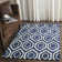 Huyet Geometric Wool Hand Woven Area Rug
