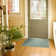Spiceland Floral Polypropylene Area Rug in Solid Gray