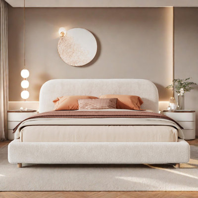 Upholstered platform bed with curved headboard and Keo loop fabric