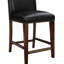 Siège confortable en similicuir brun avec tabouret de comptoir à ressorts