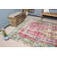 Explorez ce tapis turc floral authentique fait à la main, idéal pour rehausser l'élégance de votre salon