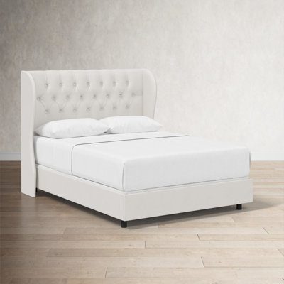 Tomey Upholstered Wingback Bed