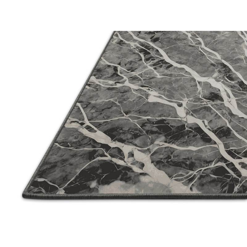 Tapis gris soyeux et moelleux