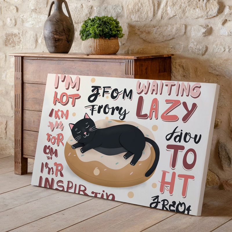 "Toile", création d'une illustration fantaisiste mettant en vedette un chat noir décontracté se prélassant sur un coussin en forme de beignet surdimensionné