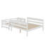 Lit simple superposé au-dessus d'un grand lit simple avec échelle