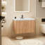 Meuble-lavabo moderne peu encombrant avec finition chêne doré et lavabo blanc
