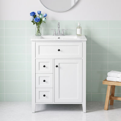 Meuble-lavabo autoportant intégré en céramique blanche 24 po avec armoire en panneau de fibres à densité moyenne blanc, bois d'hévéa massif, 3 tiroirs avec glissière de tiroir, 1 porte avec charnières, 1 tiroir basculant, poignée en métal noir, sans robinet, trois trous, ensemble central de 4 po, Blanc, finition peinte