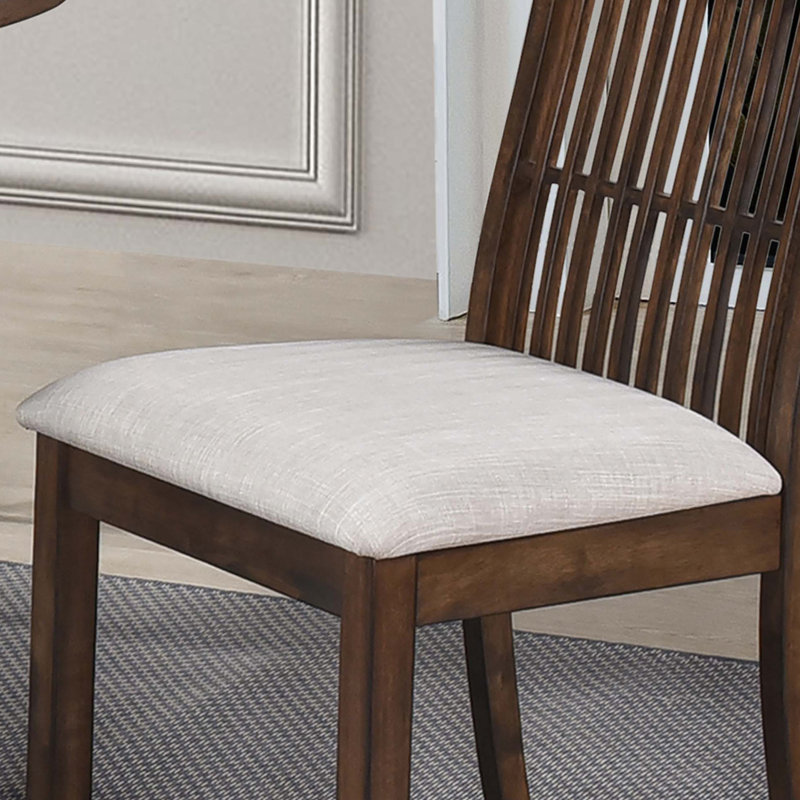 Ensemble de 2 chaises de salle à manger rustiques avec dossier à lattes, siège rembourré et finition en bois patiné pour un style campagnard et un assemblage facile.