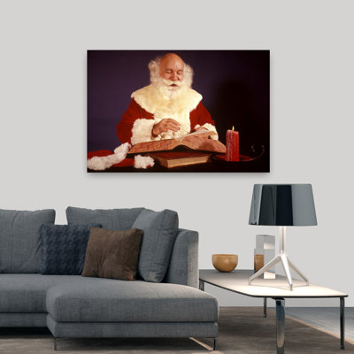1960S Bald Santa Claus Writing Or Checking List In Big Book By Candle Light Contemporary Portrait Wall Art