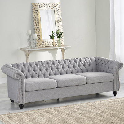 Classic Chesterfield 3-Seater Sofa With Button Tufting, Nailhead Trim, And Scrolled Arms For Timeless Elegance.