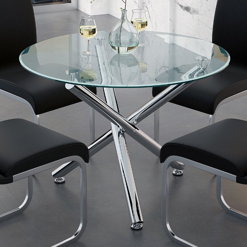 Wrought Studio Keena Round Dining Table in Chrome. PHOTO BY WAYFAIR