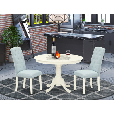 L'ensemble de mobilier de salle à manger 3 pièces comprend une table de salle à manger ronde avec piédestal et 2 chaises rembourrées en tissu bleu lin, blanc lin