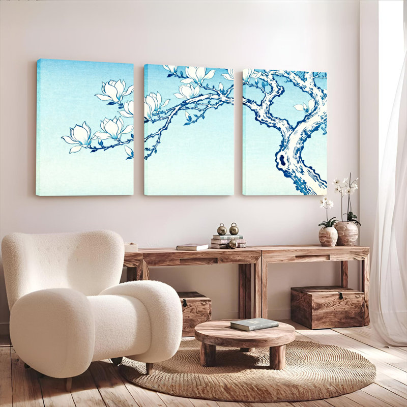 Ensemble de 3 tableaux sur toile tendue représentant un magnolia bleu et blanc, H 30 po x l 60 po