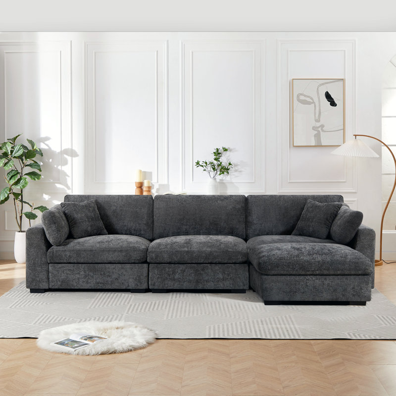 Aariketh 130.87”Wide Upholstered Loose Back Modular Sectional Sofa with Large Ottoman, Dark Grey Polyester