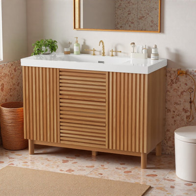 Meuble-lavabo de salle de bain de 47,2 pouces avec lavabo en résine SMC, armoire en MDF avec pieds en bois massif, portes et tiroirs à fermeture douce et étagères réglables, un meuble de rangement de salle de bain moderne.