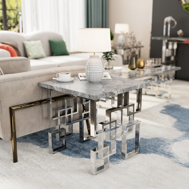 Grey And Silver End Table With Polished Metal Geometric Base