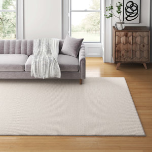 Charvik Solid Color Handmade Area Rug in Ivory