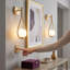 Lot de 2 appliques murales en forme de larme, fini or brossé, 47 cm (18,5 po), luminaire en verre opalin blanc.
