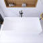 66.9'' x 28.3'' Freestanding Soaking Solid Surface Bathtub