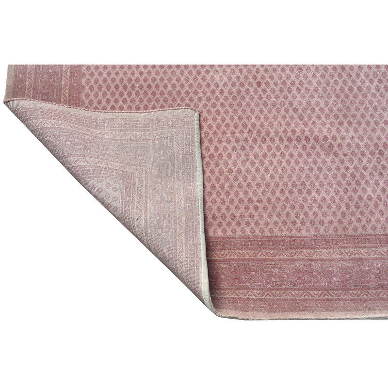 Tapis rose noué à la main de haute qualité