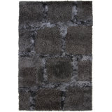Areva Shag Black Area Rug